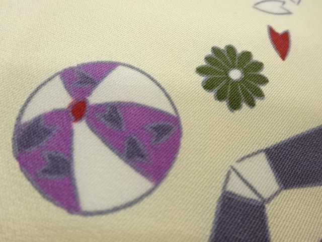  玩具・草花・蝶模様名古屋帯